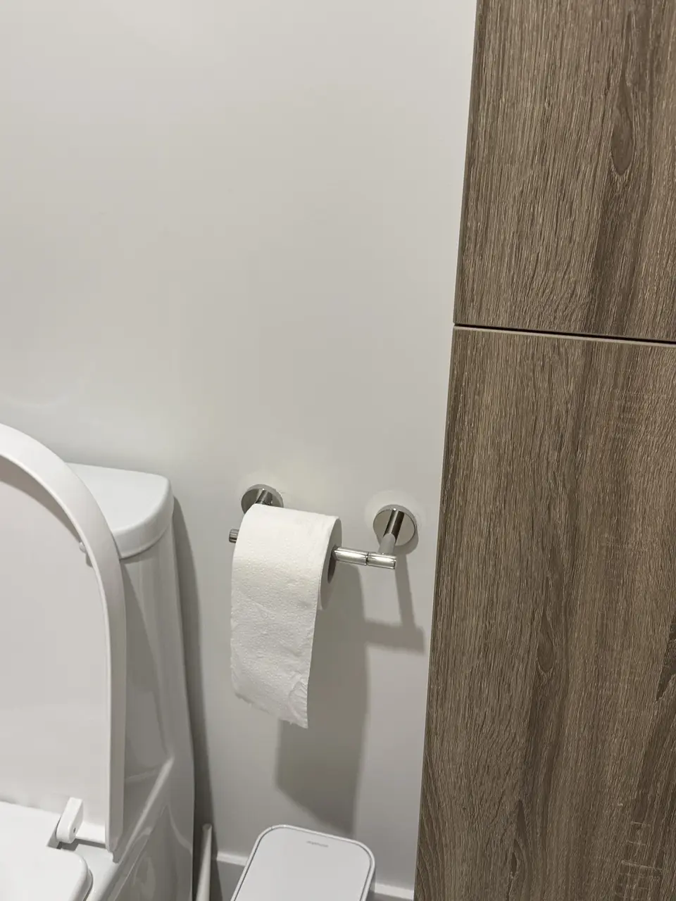 Toilet-paper holder installed in a Montreal condo bathroom